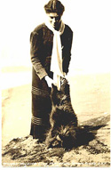 [ Woman holding live porcupine]