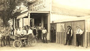 [outside Winkler's Saloon]